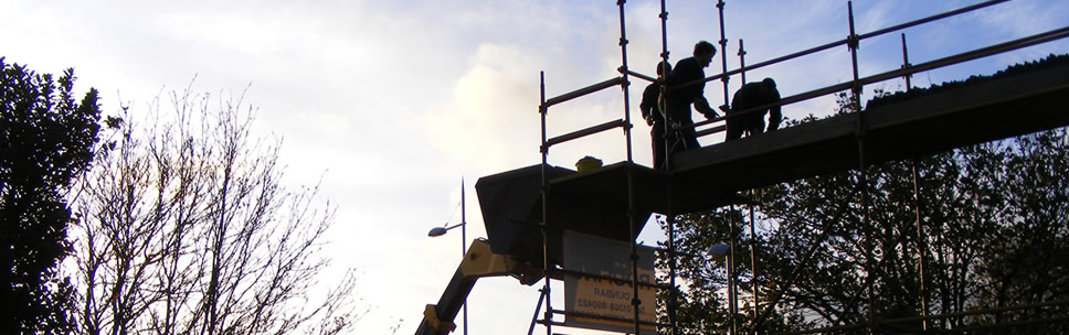 Image of Border Roofing specialists working on roof